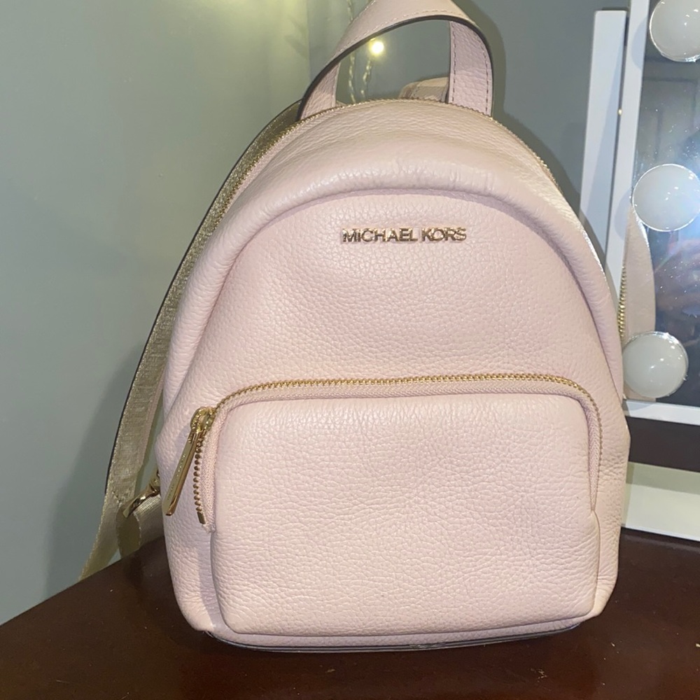 Light pink micheal kors backpack